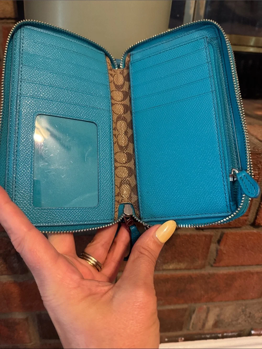 Coach Teal Zip-Around Wristlet Wallet